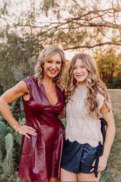 Janna Weaver with her daughter at sunset